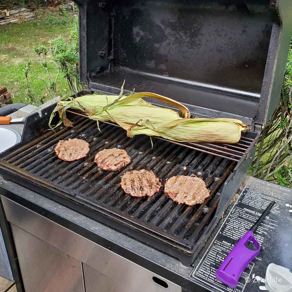 burgers and corn on the grill