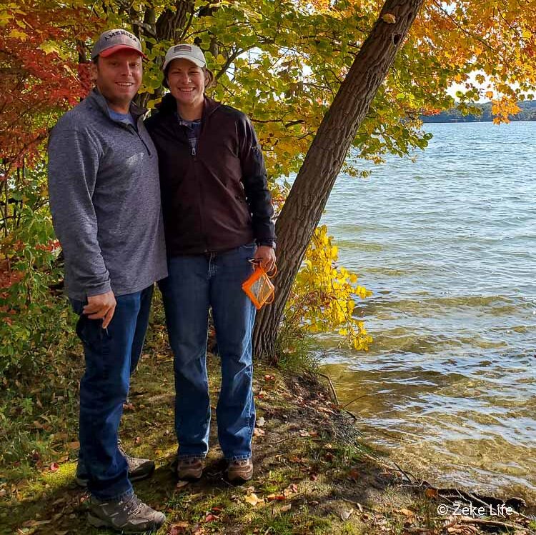 kyle and kara hiking by a lake