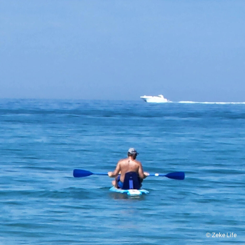 kyle floating on SUP