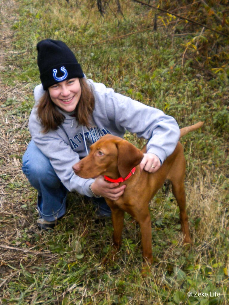 zeke and kara in a field