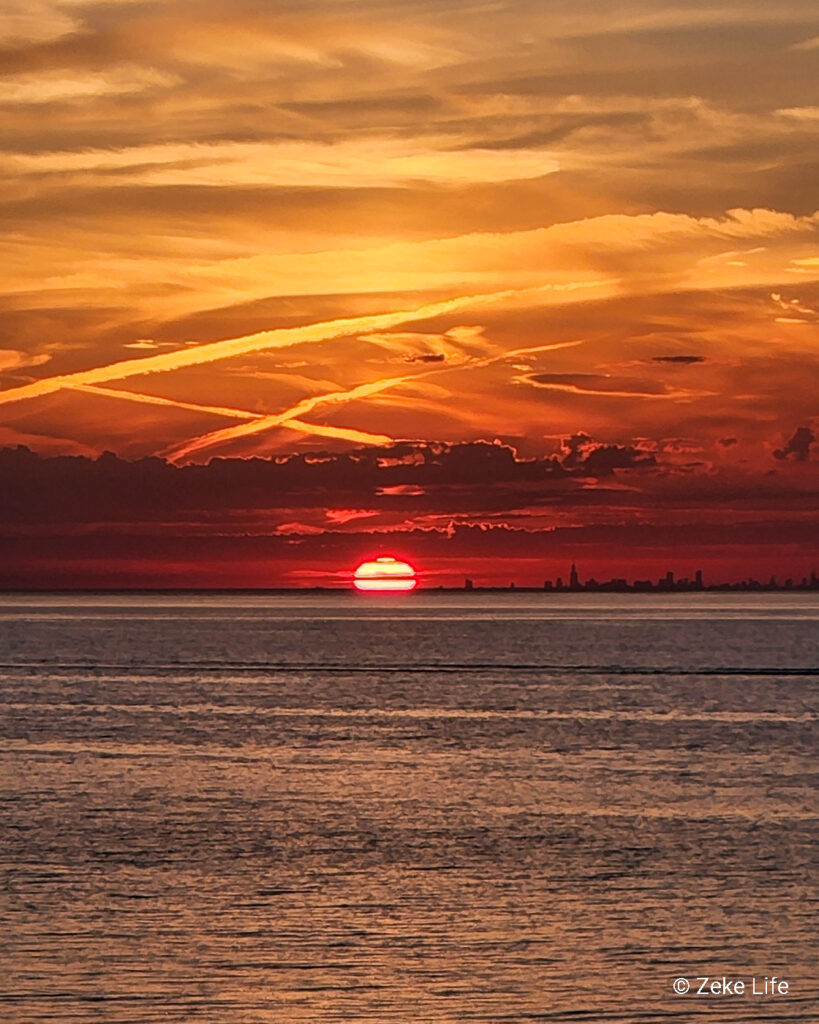 lake michigan sunset with chicago skyline