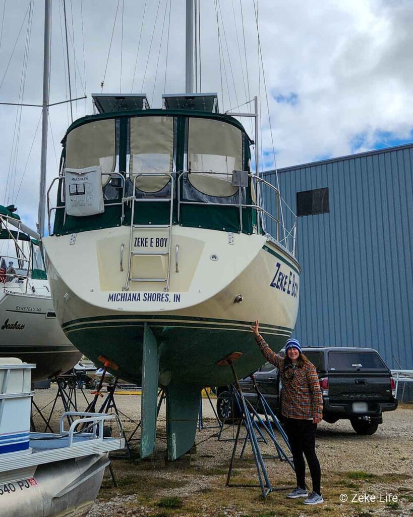 kara standing next to boat