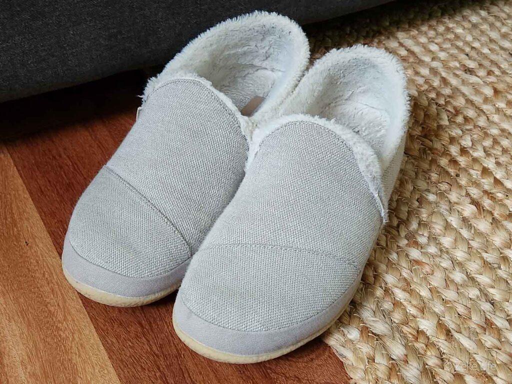 kara slippers on hardwood