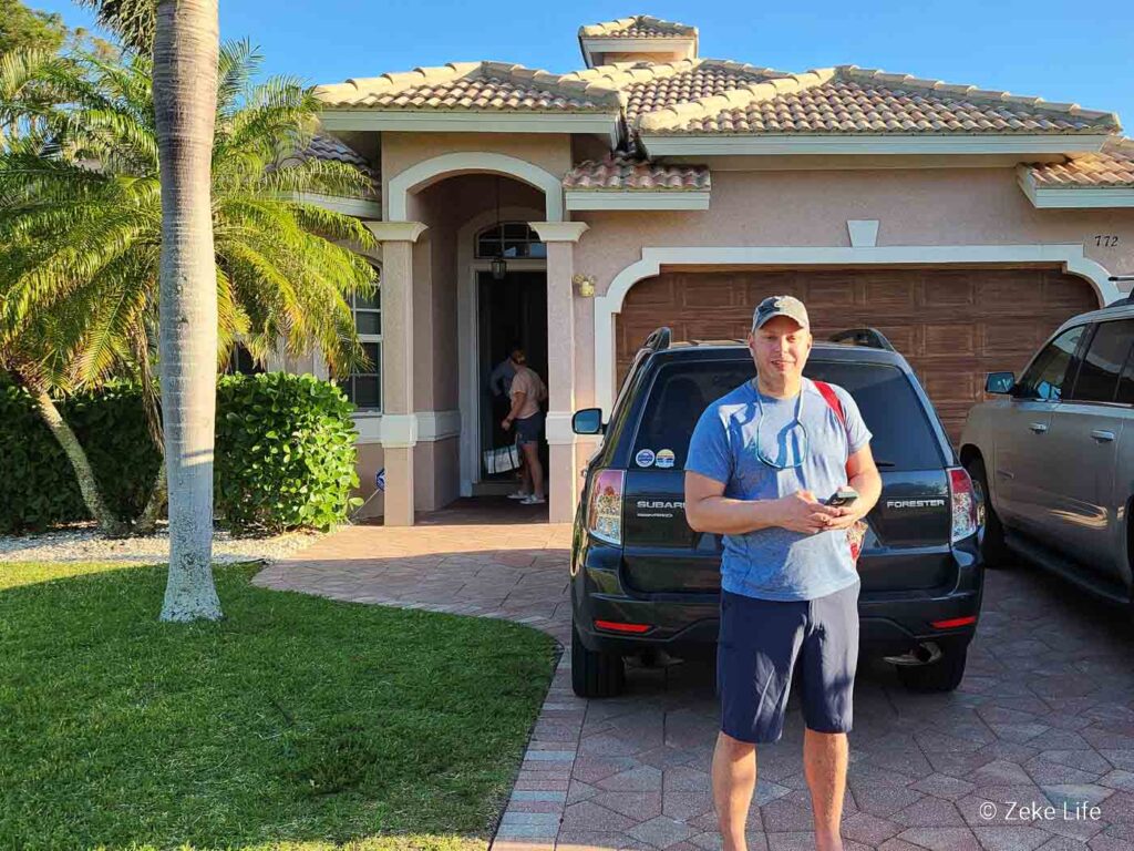 Kyle in front of rental house in Naples