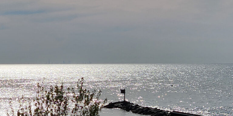 chicago skyline in the distance from New Buffalo Harbor entrance