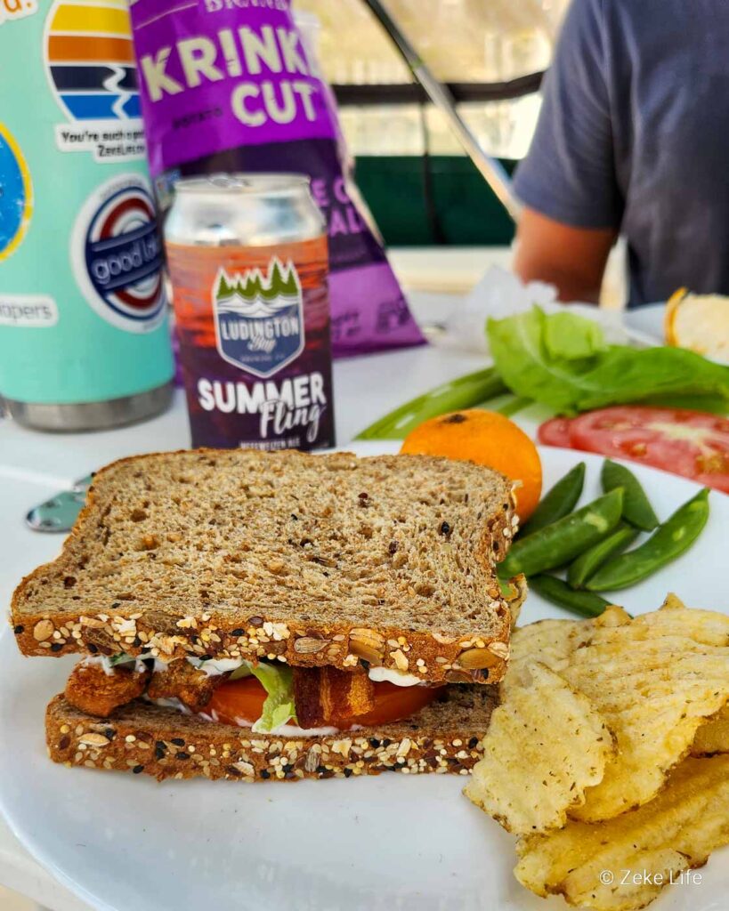 blt with chips + beer on the boat